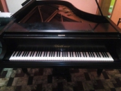 Piano's Blüthner vleugelpiano